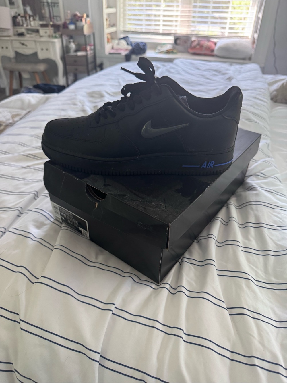 Nike Air Force 1 Black Low-Top Air Sneakers with Blue
